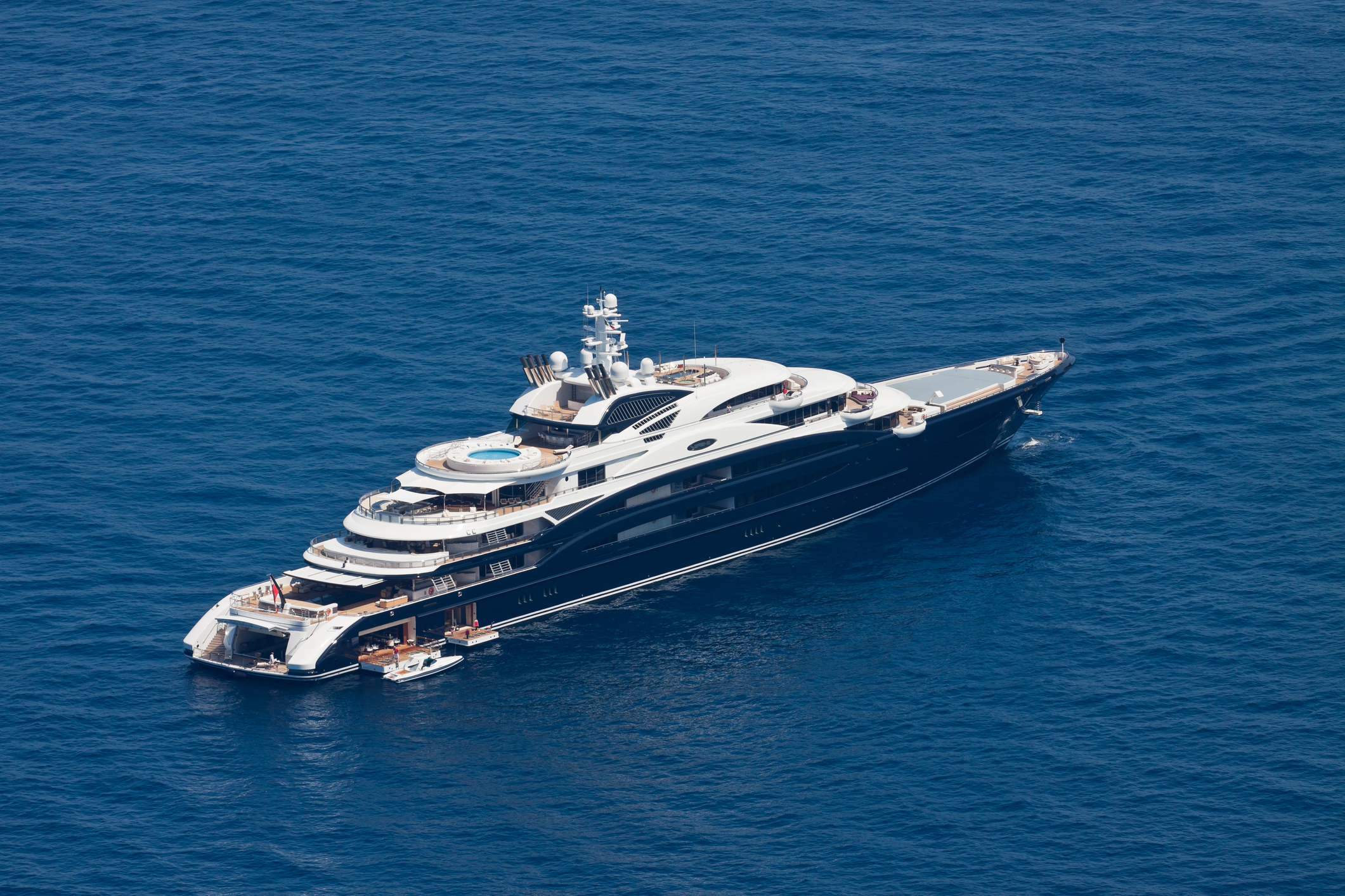Mega yacht Capri, Italy - August 20, 2011: The Fincantieri mega yacht SERENE moored in a bay of the isle of Capri, Italy. The motoryacht Serene (134 mt) is the largest yacht ever built in Italy and one of the most largest yachts in the world.